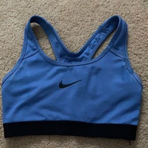 Blue Nike sports bra. Barely worn, bought it too small.